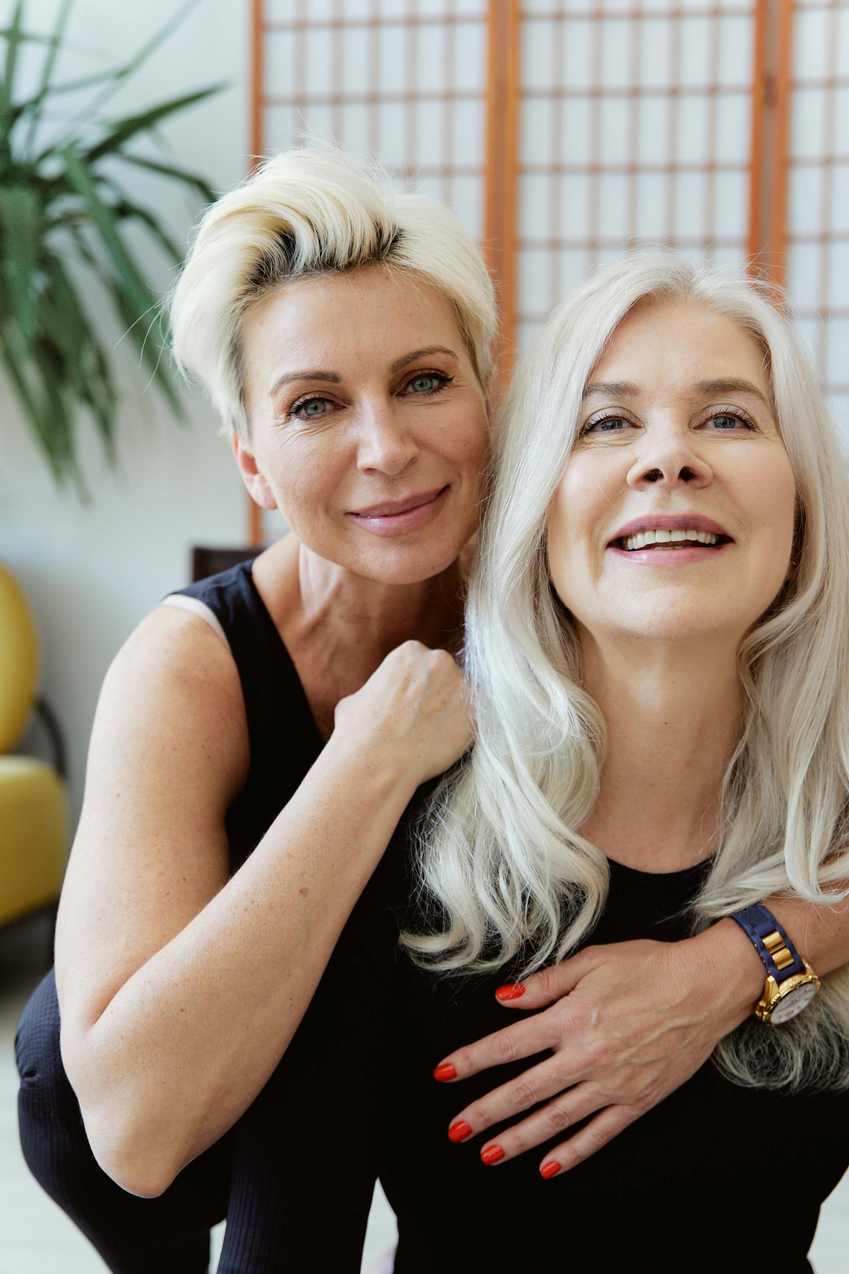 Two women in their 40s in exercise clothing â€” active and well in midlife