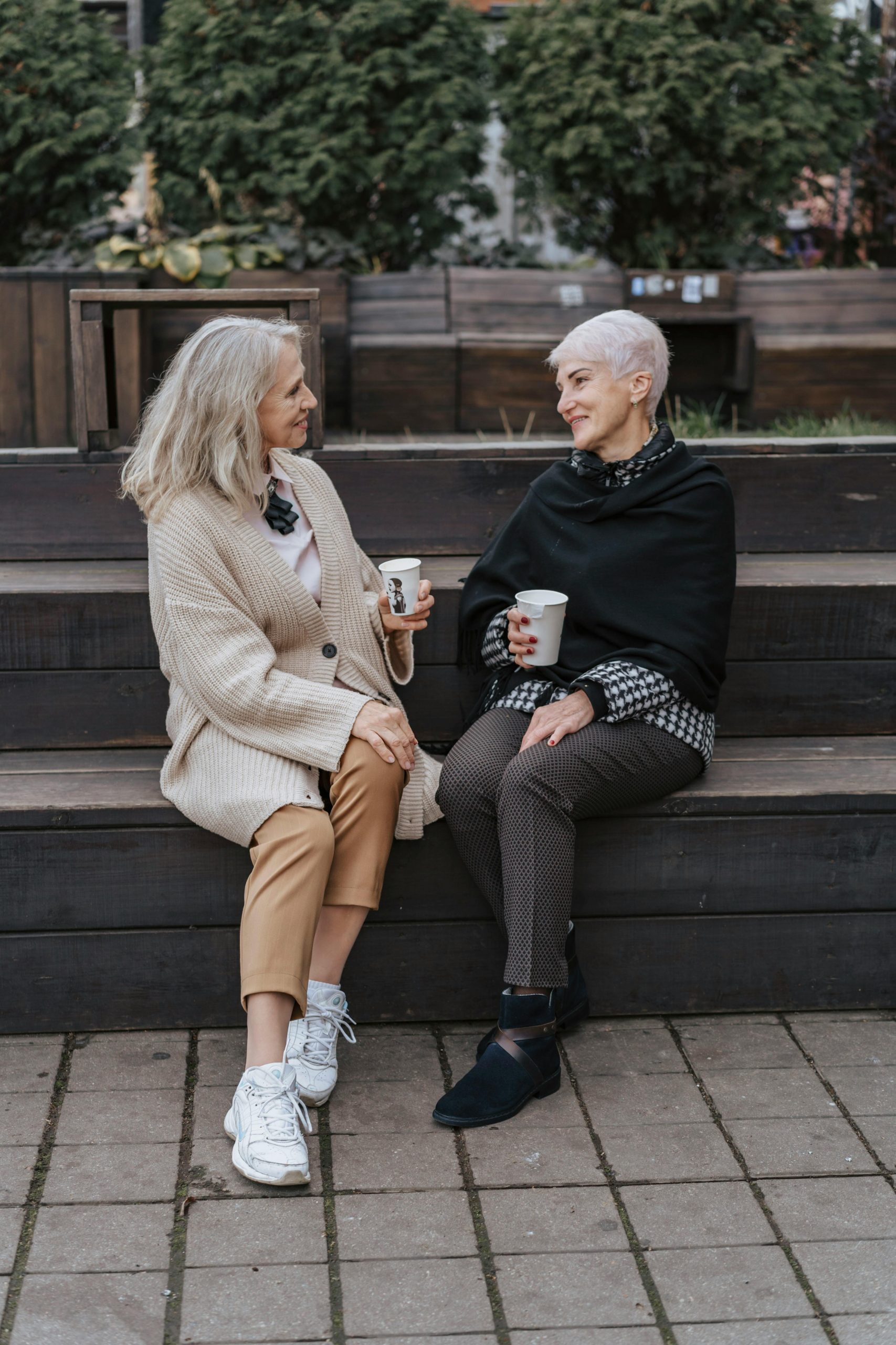 Two women outdoors, active and smiling — enjoying everyday life without restrictions